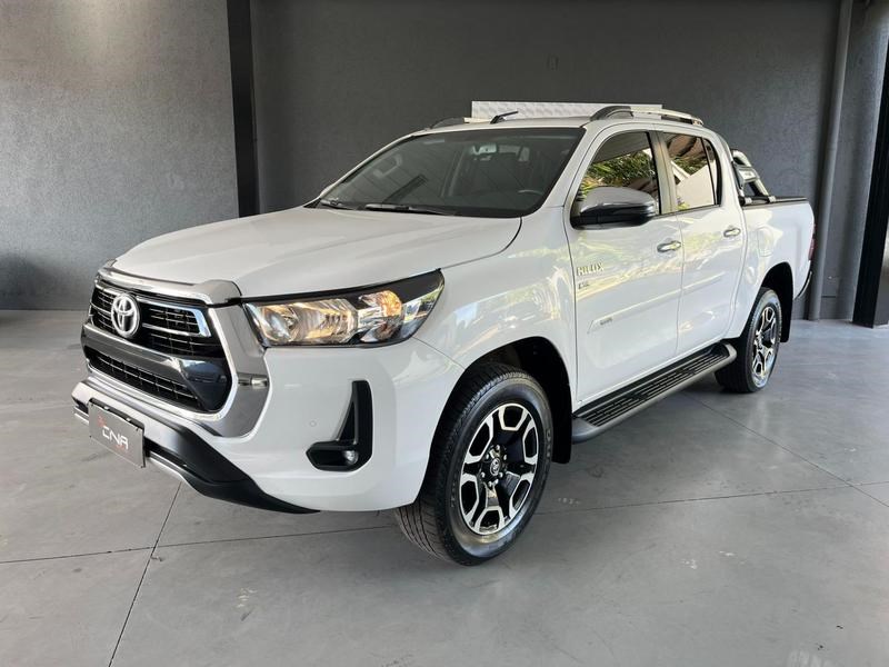 //www.autoline.com.br/carro/toyota/hilux-27-cd-srv-16v-flex-4p-automatico/2021/campo-grande-ms/24417907