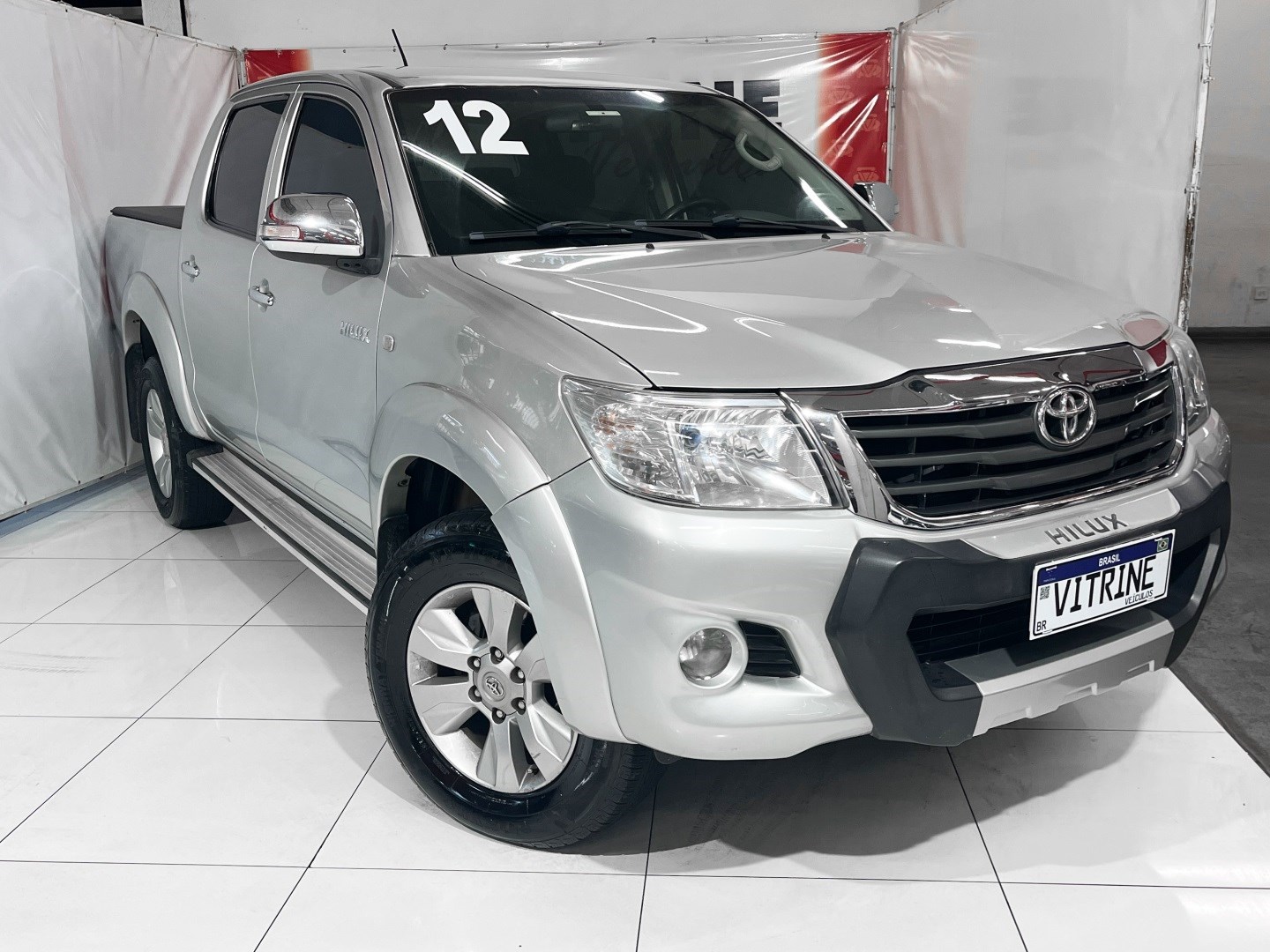 //www.autoline.com.br/carro/toyota/hilux-27-cd-sr-16v-flex-4p-automatico/2012/belo-horizonte-mg/24479037