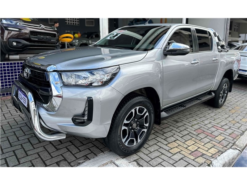 //www.autoline.com.br/carro/toyota/hilux-27-cd-srv-16v-flex-4p-automatico/2021/sao-paulo-sp/24665388