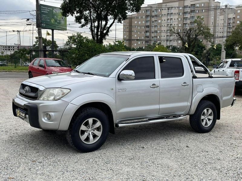 //www.autoline.com.br/carro/toyota/hilux-27-cd-sr-16v-gasolina-4p-manual/2009/curitiba-pr/24884743
