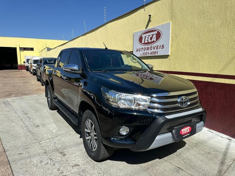 //www.autoline.com.br/carro/toyota/hilux-28-cd-srv-16v-diesel-4p-4x4-turbo-automatico/2017/campo-grande-ms/24898275