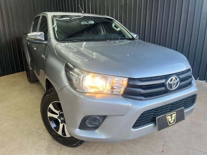 //www.autoline.com.br/carro/toyota/hilux-27-cd-sr-16v-flex-4p-manual/2020/campo-grande-ms/24902797