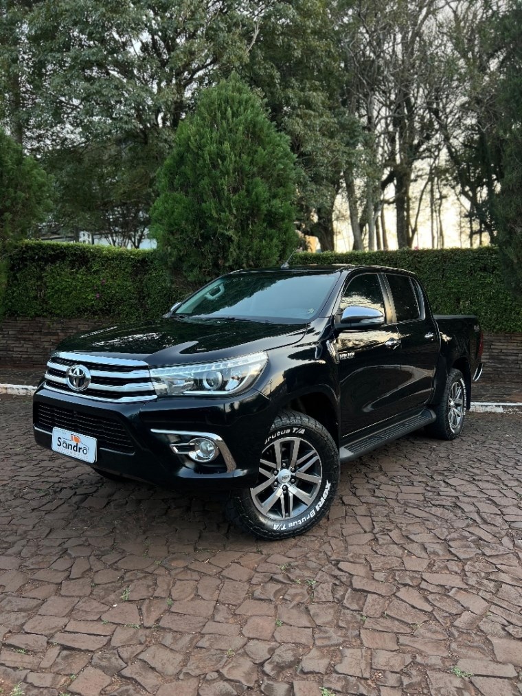 //www.autoline.com.br/carro/toyota/hilux-28-srx-cd-16v-diesel-4p-4x4-turbo-automatico/2016/ijui-rs/24941863