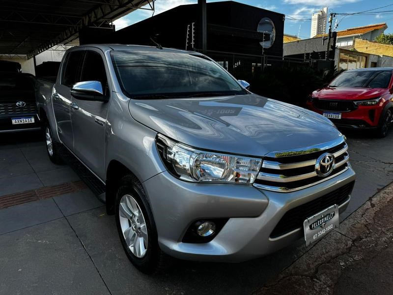 //www.autoline.com.br/carro/toyota/hilux-28-cd-srv-16v-diesel-4p-4x4-turbo-automatico/2018/campo-grande-ms/24972610