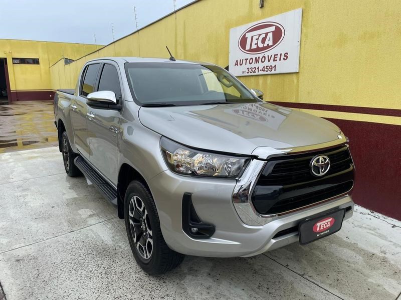 //www.autoline.com.br/carro/toyota/hilux-27-cd-sr-16v-flex-4p-automatico/2021/campo-grande-ms/25024132