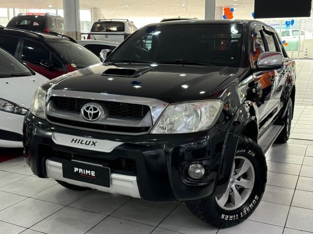 //www.autoline.com.br/carro/toyota/hilux-30-cd-srv-16v-diesel-4p-4x4-turbo-automatico/2009/osasco-sp/25033598