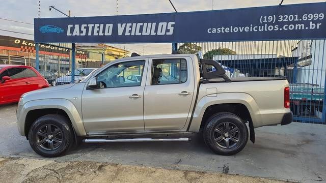 //www.autoline.com.br/carro/volkswagen/amarok-20-cd-trendline-16v-diesel-4p-4x4-turbo-autom/2013/campinas-sp/24186160