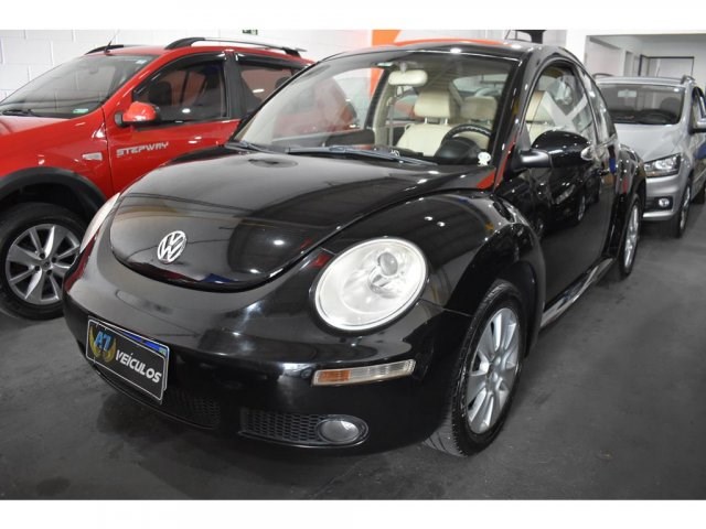 //www.autoline.com.br/carro/volkswagen/new-beetle-20-l-8v-gasolina-2p-automatico/2008/votorantim-sp/16424275