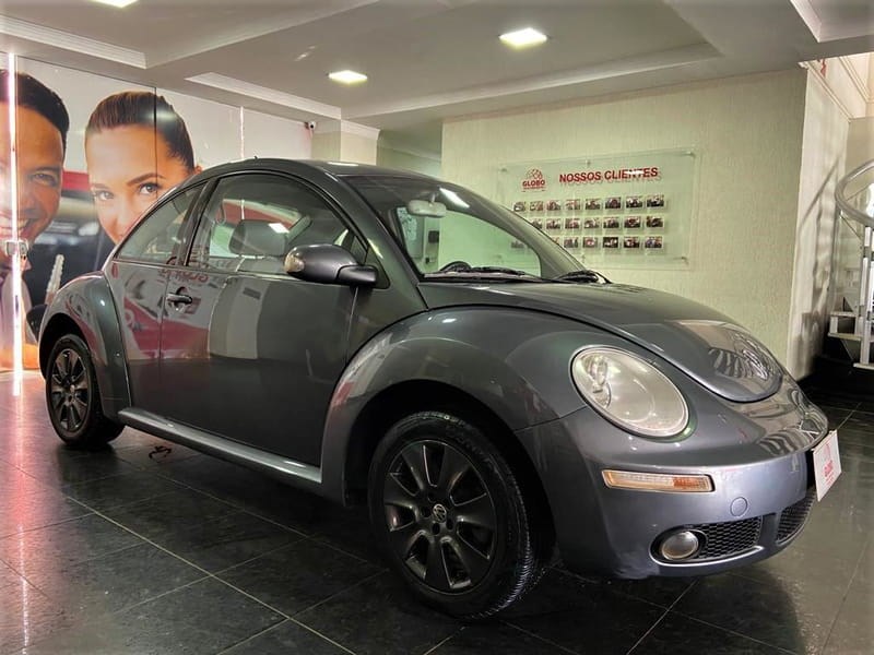 //www.autoline.com.br/carro/volkswagen/new-beetle-20-l-8v-gasolina-2p-automatico/2008/brasilia-df/16545725