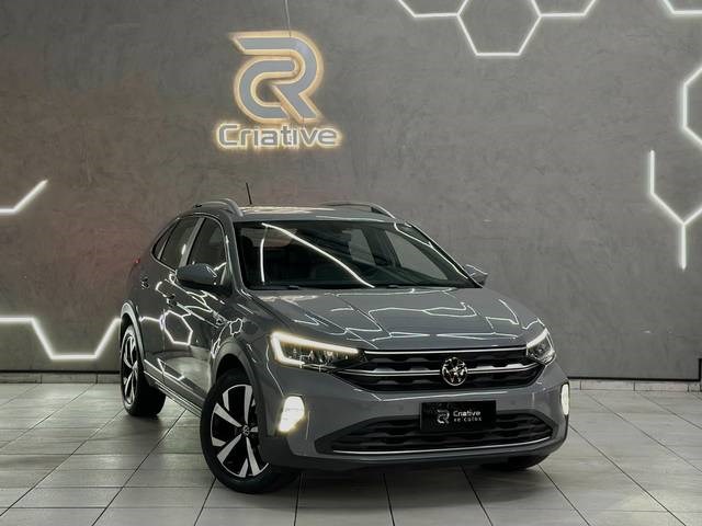 //www.autoline.com.br/carro/volkswagen/nivus-10-200-tsi-highline-12v-flex-4p-turbo-automat/2022/carapicuiba-sp/22646860
