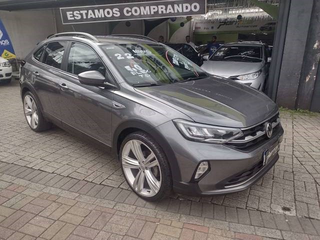 //www.autoline.com.br/carro/volkswagen/nivus-10-200-tsi-comfortline-12v-flex-4p-turbo-auto/2022/barueri-sp/23528774