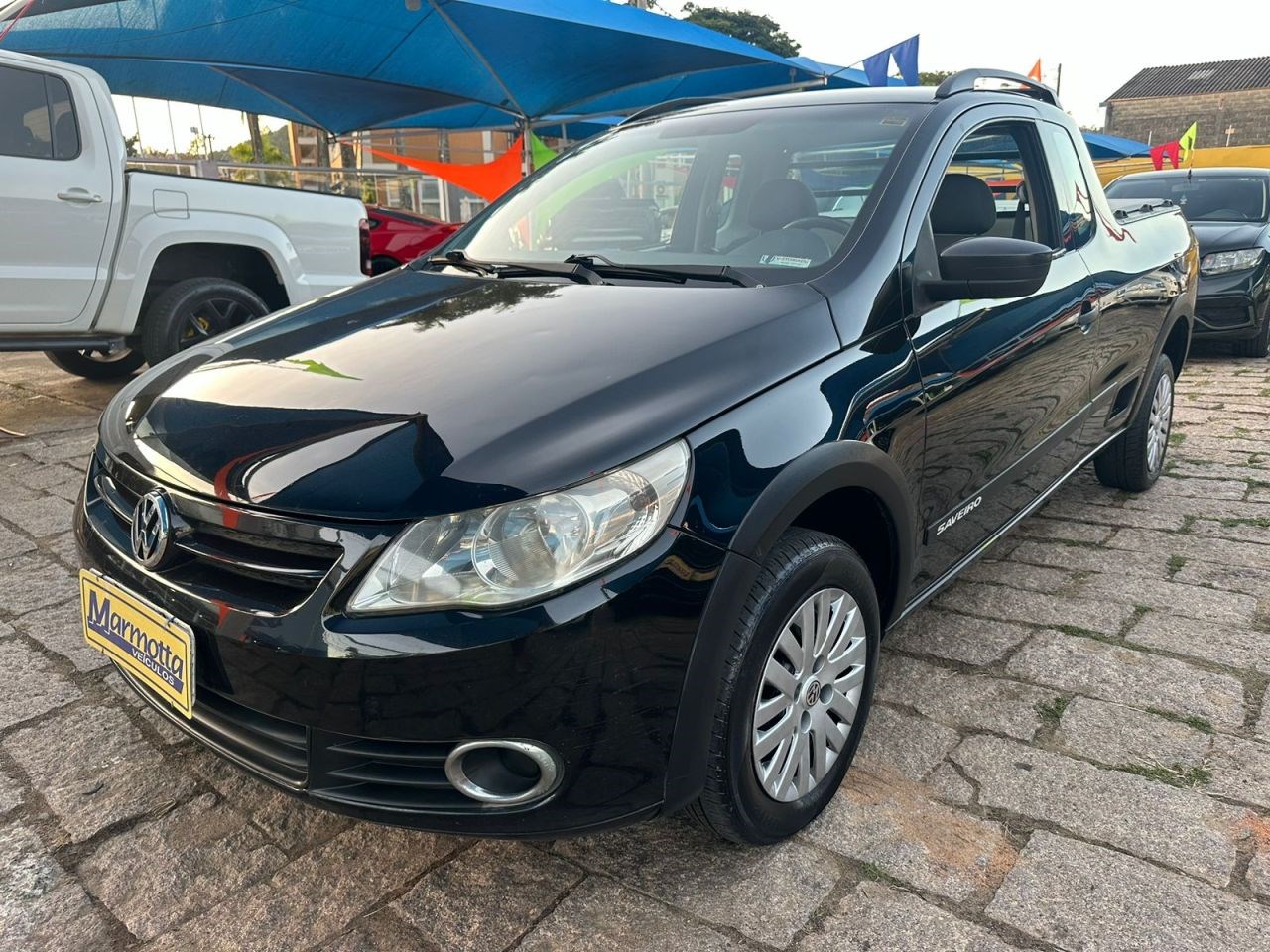 //www.autoline.com.br/carro/volkswagen/saveiro-16-ce-8v-flex-2p-manual/2011/amparo-sp/24211012