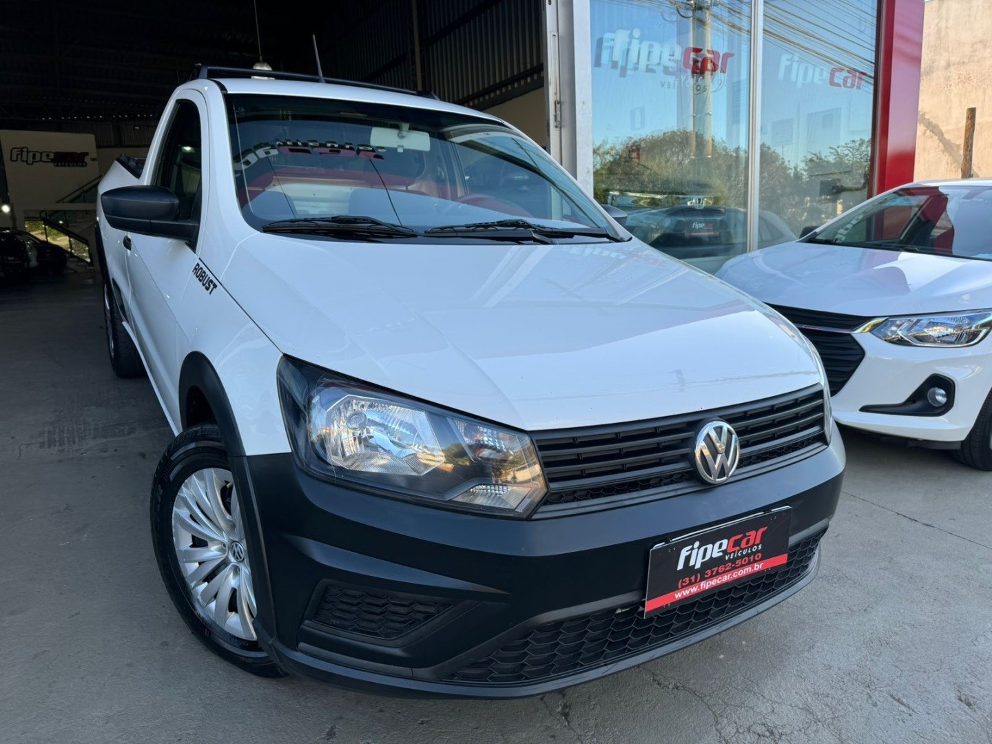 //www.autoline.com.br/carro/volkswagen/saveiro-16-cs-robust-8v-flex-2p-manual/2019/conselheiro-lafaiete-mg/24589209