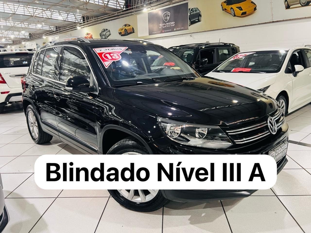 //www.autoline.com.br/carro/volkswagen/tiguan-20-tsi-16v-gasolina-4p-4x4-turbo-automatico/2013/sao-paulo-sp/23424484