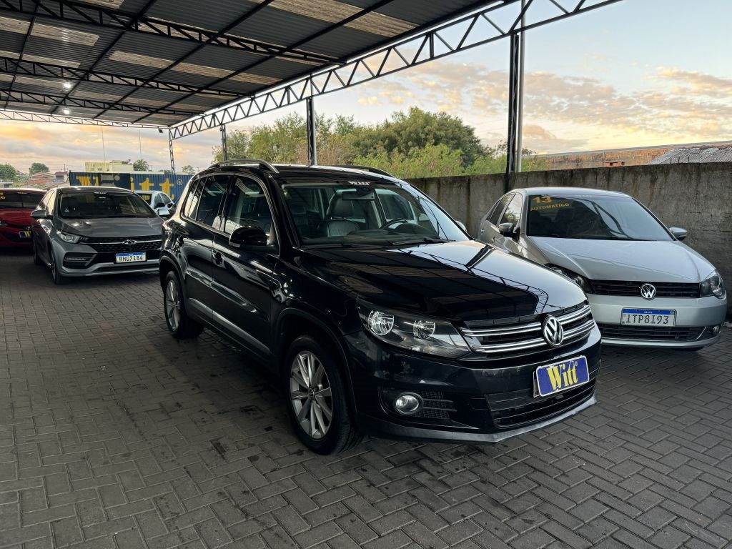 //www.autoline.com.br/carro/volkswagen/tiguan-20-tsi-16v-gasolina-4p-4x4-turbo-automatico/2012/gravatai-rs/24388507