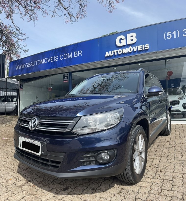 //www.autoline.com.br/carro/volkswagen/tiguan-20-tsi-16v-gasolina-4p-4x4-turbo-automatico/2013/porto-alegre-rs/24590389