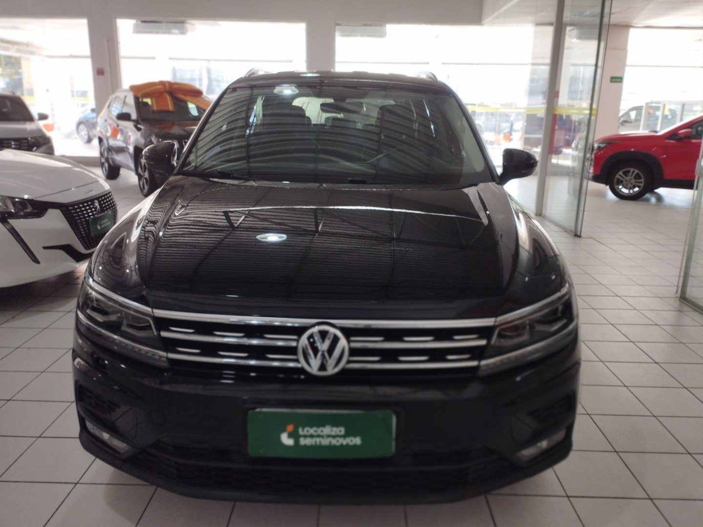 //www.autoline.com.br/carro/volkswagen/tiguan-allspace-14-250-tsi-comfortline-16v-flex-4p-turbo-auto/2019/sao-paulo-sp/24521215