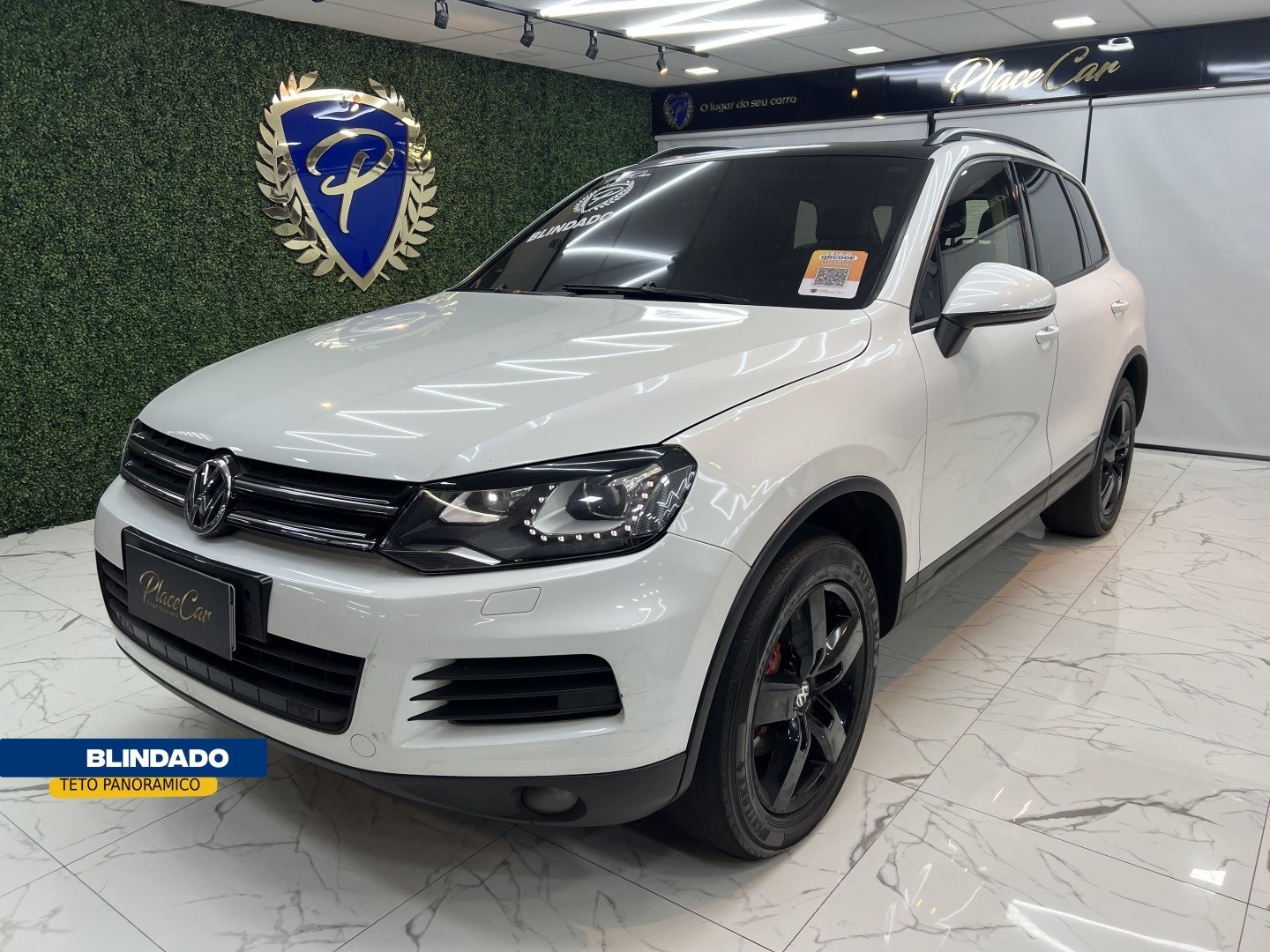 //www.autoline.com.br/carro/volkswagen/touareg-36-v6-fsi-24v-gasolina-4p-4x4-automatico/2014/rio-de-janeiro-rj/24814104