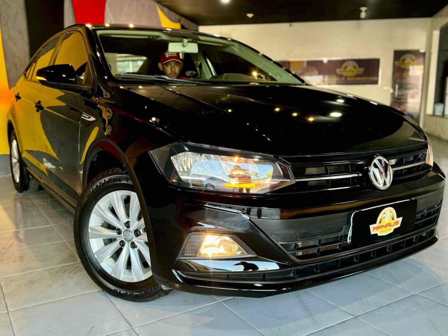 //www.autoline.com.br/carro/volkswagen/virtus-16-16v-flex-4p-automatico/2019/manaus-am/24922568